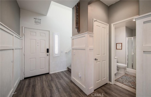 foyer featuring dark wood-type flooring