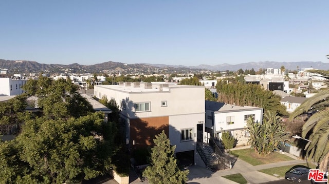 drone / aerial view featuring a mountain view