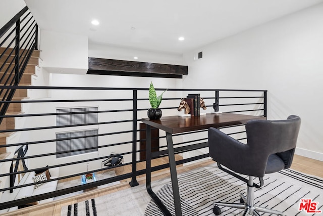 office space with light hardwood / wood-style floors