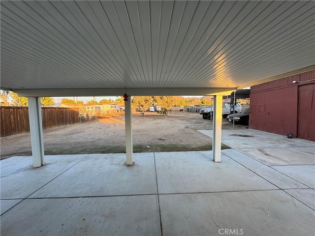 view of patio / terrace featuring a carport