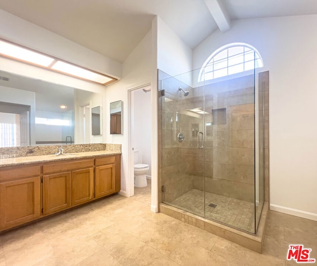 bathroom with vanity, lofted ceiling with beams, toilet, and a shower with shower door