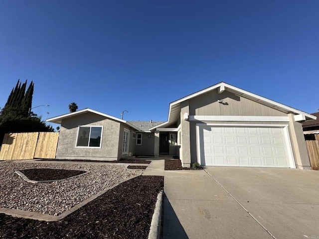 single story home with a garage