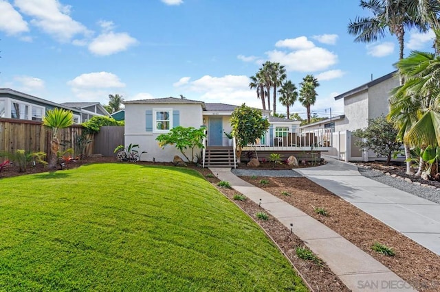 bungalow-style house featuring a front yard