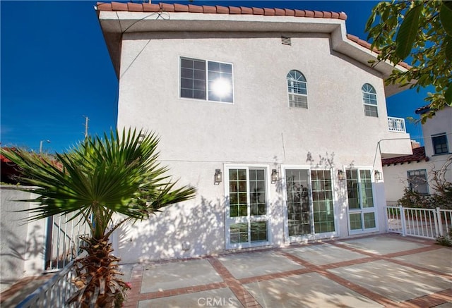 rear view of property with a patio