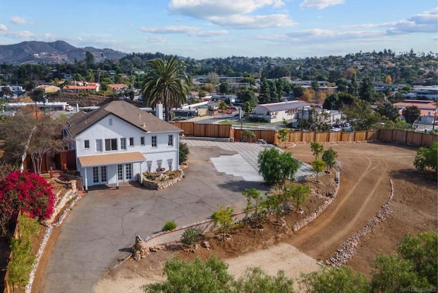 drone / aerial view featuring a mountain view