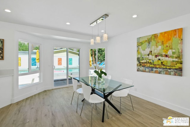 dining area with light wood-type flooring