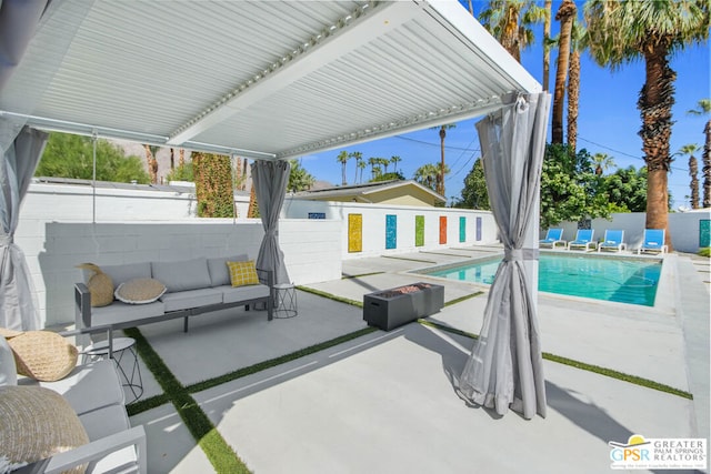 view of patio featuring a fenced in pool