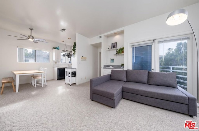 living room featuring ceiling fan