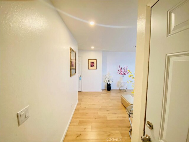 hallway featuring light hardwood / wood-style floors