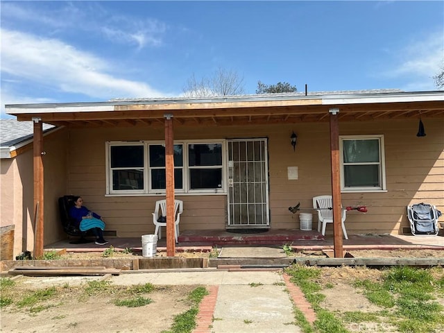 rear view of property with a patio area