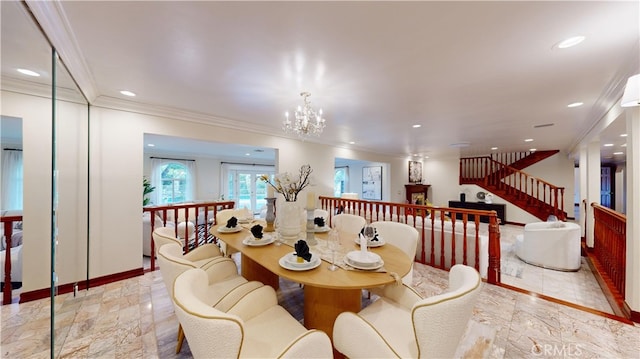 dining area featuring ornamental molding and an inviting chandelier