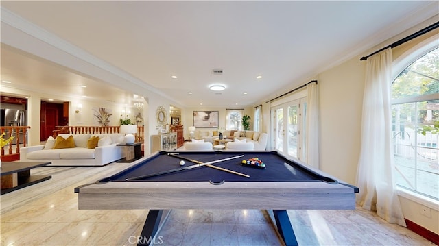 playroom featuring plenty of natural light, crown molding, and pool table