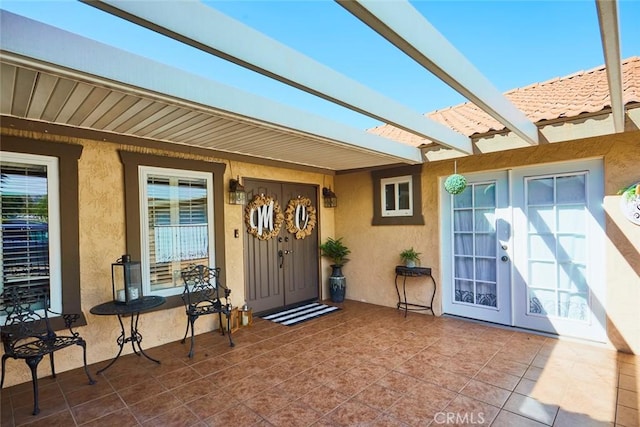 property entrance with french doors