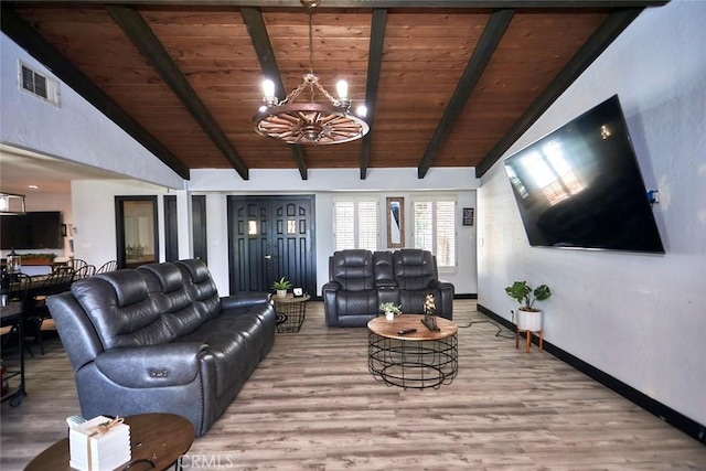 living room featuring vaulted ceiling with beams, wood-type flooring, wood ceiling, and a chandelier