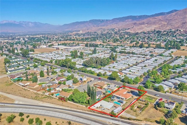 bird's eye view with a mountain view