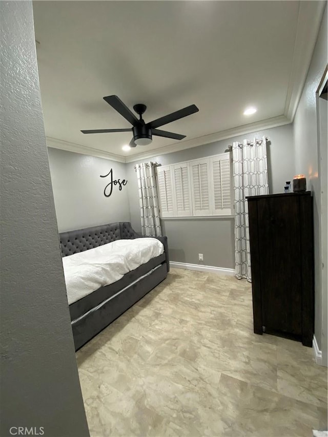 bedroom featuring ceiling fan and crown molding