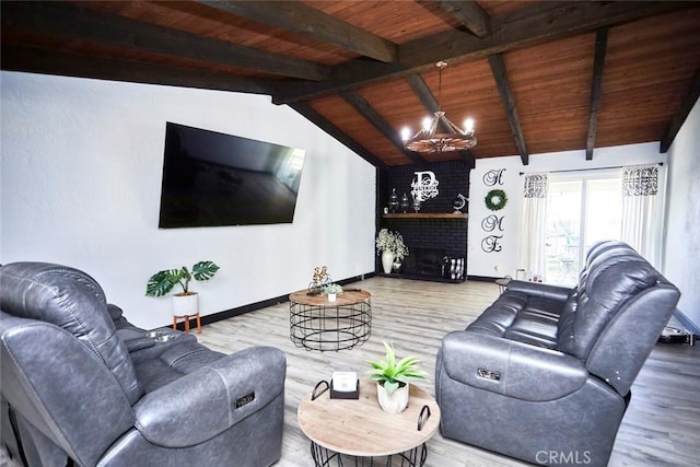 living room featuring hardwood / wood-style floors, vaulted ceiling with beams, wood ceiling, and an inviting chandelier