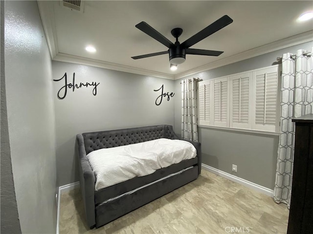 bedroom featuring ceiling fan and crown molding