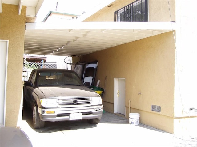 garage with a carport