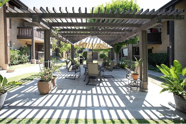 view of patio / terrace featuring a pergola