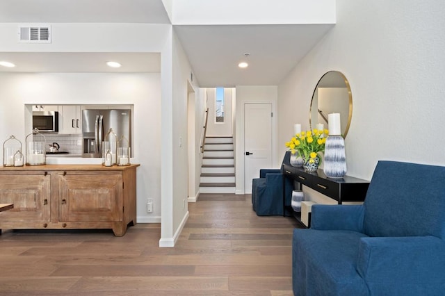 entrance foyer with hardwood / wood-style flooring