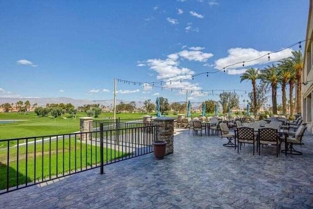 view of patio with a mountain view