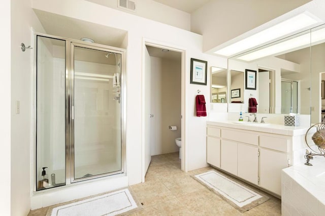 full bathroom featuring tile patterned flooring, vanity, toilet, and independent shower and bath