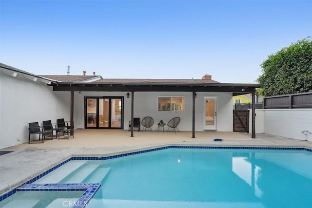 back of house featuring a patio