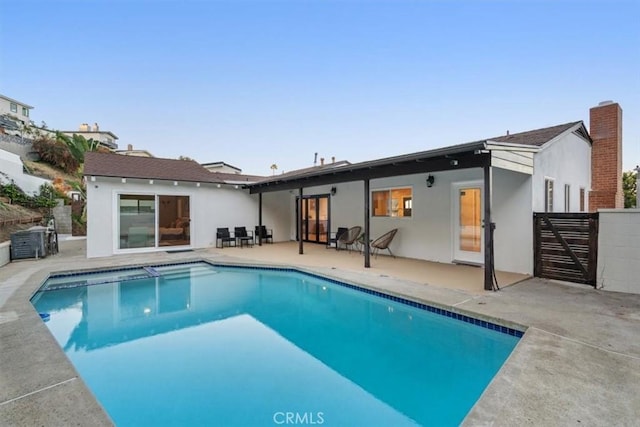 back of house featuring a patio