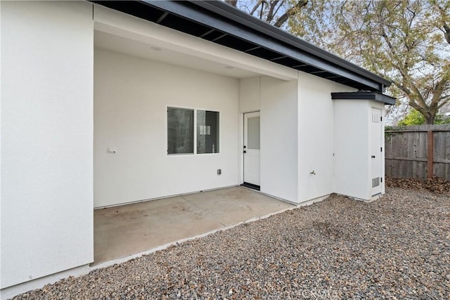 1122 W Sacramento Ave, Chico, CA 95926 - rear view of property with stucco siding and a patio area