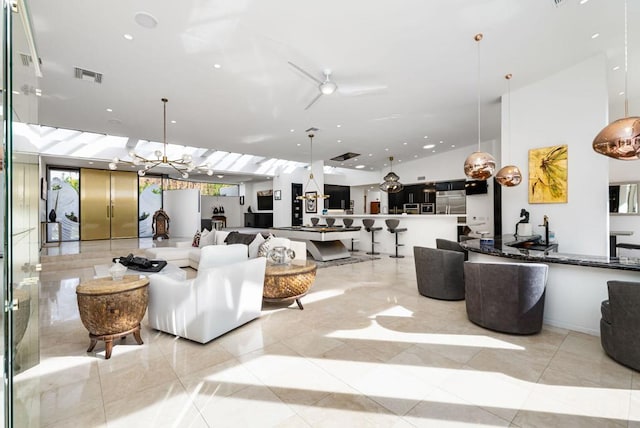 interior space with an inviting chandelier and light tile patterned flooring