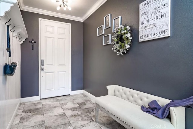 foyer entrance featuring ornamental molding