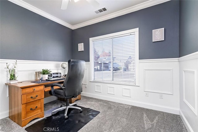 carpeted office space with ceiling fan and crown molding