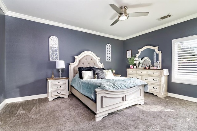 carpeted bedroom featuring ceiling fan and ornamental molding