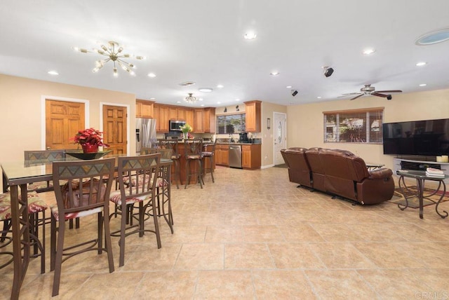 dining area with ceiling fan