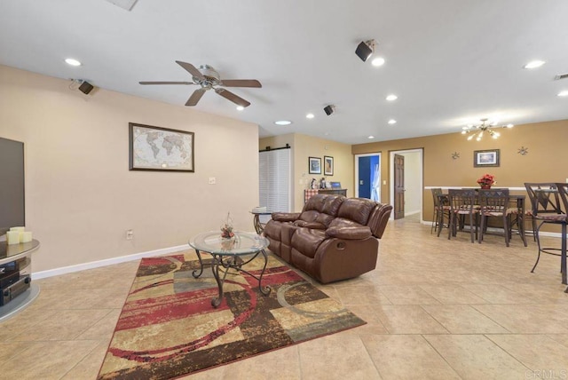 tiled living room featuring ceiling fan