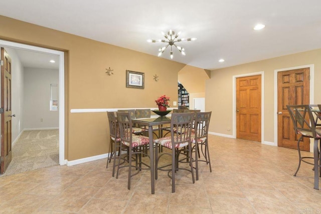 dining room with a chandelier