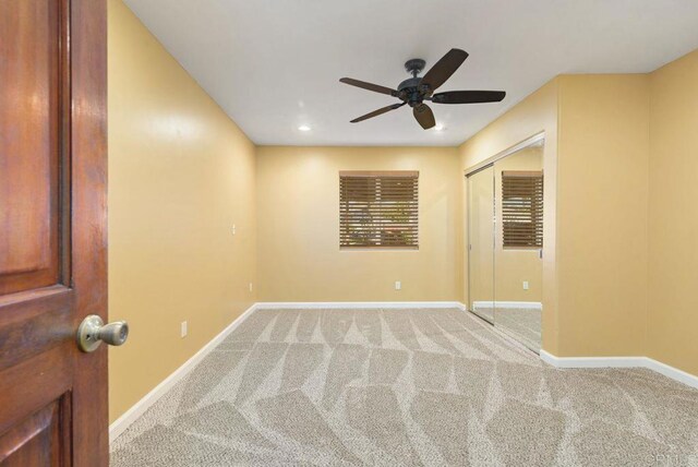 14429 Springvale St, Poway, CA 92064 - spare room with light colored carpet, baseboards, and ceiling fan