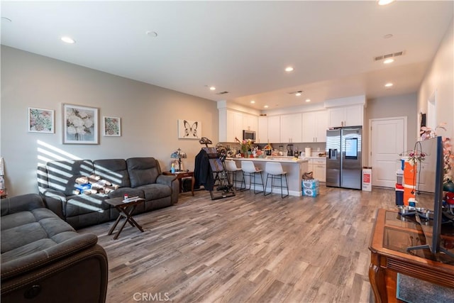 living room featuring light hardwood / wood-style flooring