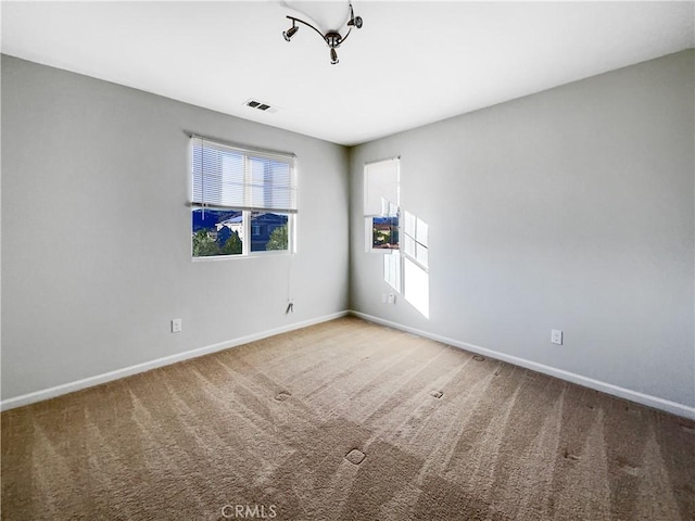 view of carpeted spare room