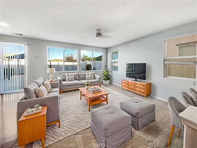 living room with ceiling fan