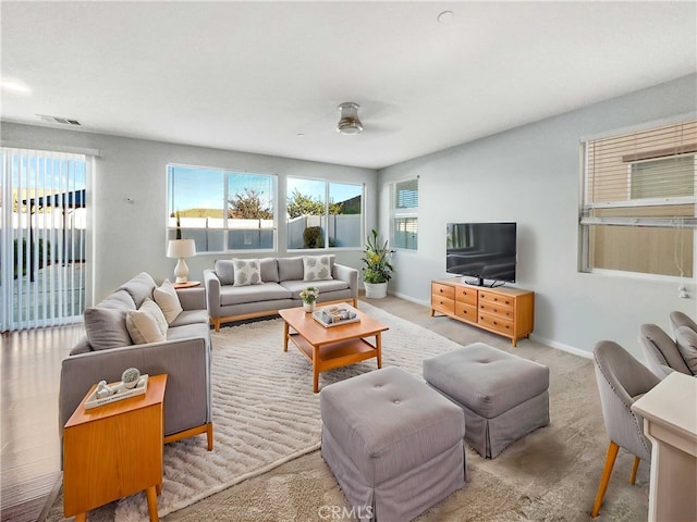 living room with ceiling fan