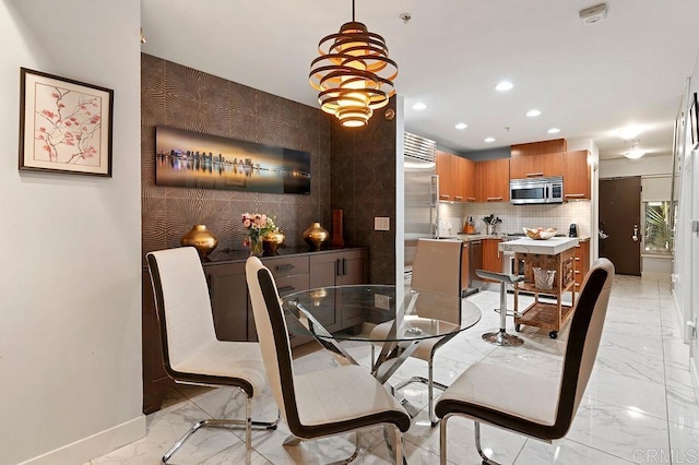 dining room featuring a notable chandelier