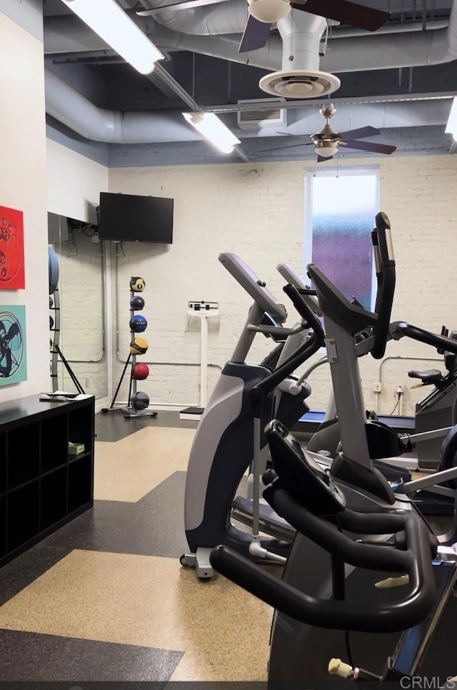 gym featuring ceiling fan