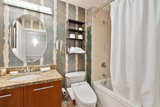 full bathroom featuring vanity, toilet, and shower / bathtub combination with curtain