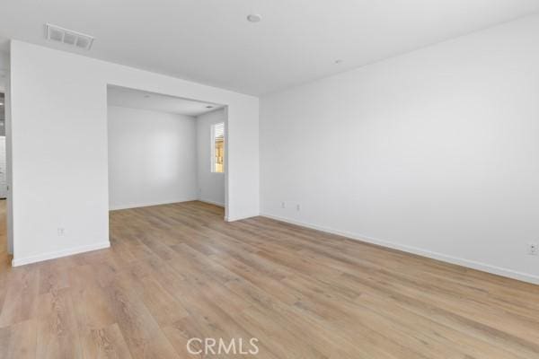 empty room featuring light hardwood / wood-style floors