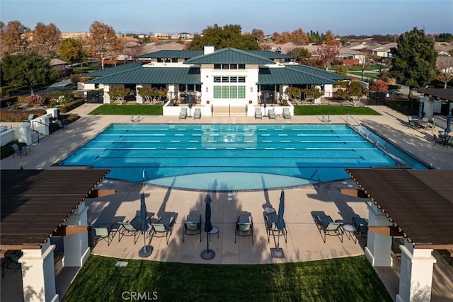 view of swimming pool featuring a patio