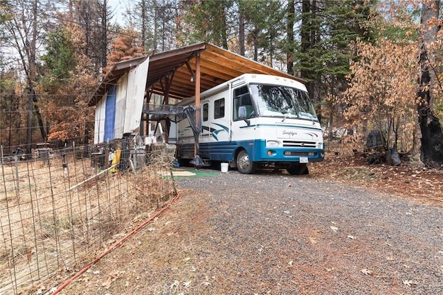 view of front of house featuring a carport