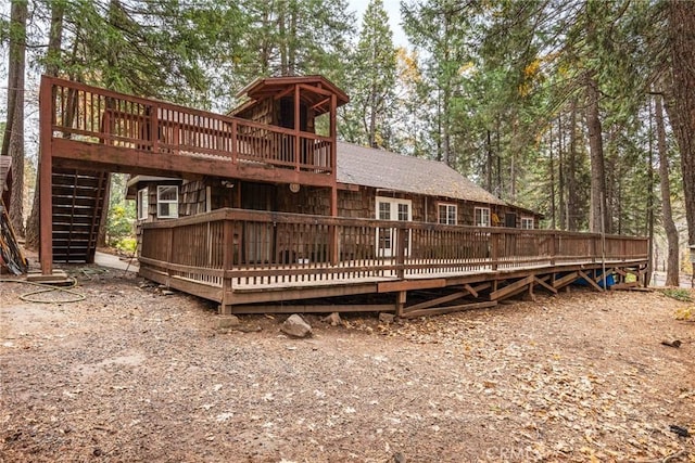 rear view of property with a deck