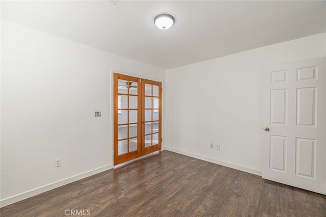 unfurnished room featuring french doors and dark hardwood / wood-style floors